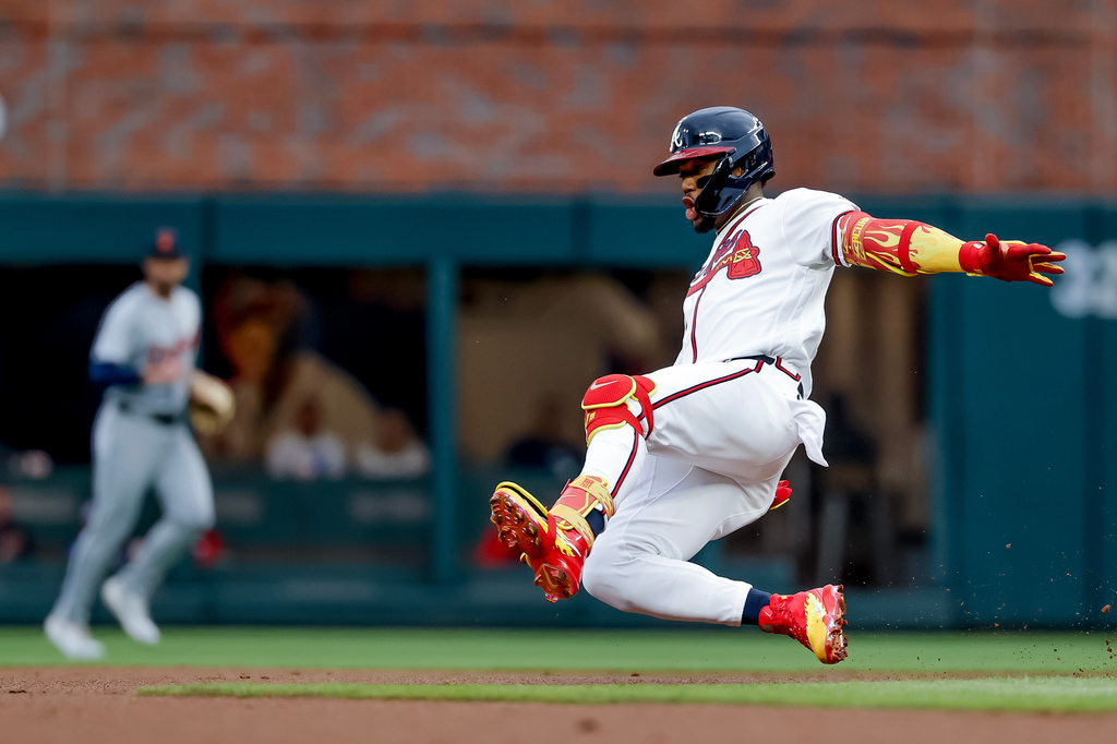 Atlanta Braves' Ronald Acuna Jr. (13) slides in safe at second base with a leadoff double against the Detroit Tigers during the first inning of a baseball game, Tuesday, April 28, 2026, in Atlanta. (AP Photo/Erik S. Lesser)