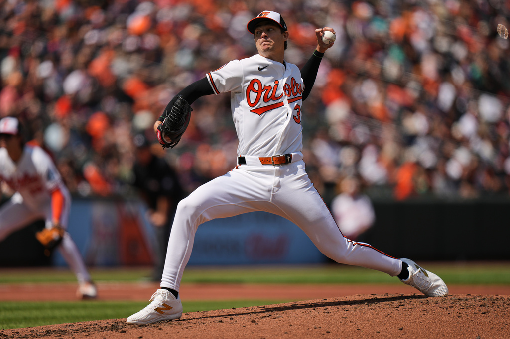 Baltimore Orioles' Cade Povich delivers during the third inning of a baseball game against the San Francisco Giants, Sunday, April 12, 2026, in Baltimore. (AP Photo/Stephanie Scarbrough)