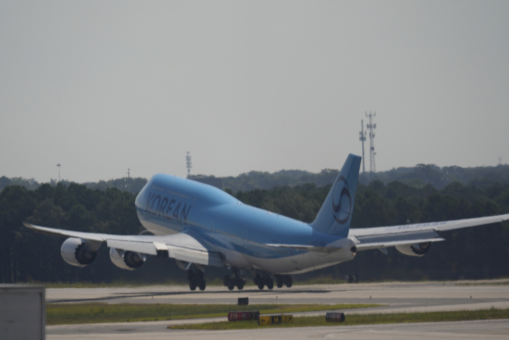 A plane takes off with Korean workers that were detained at Hartsfield-Jackson International Airport in Atlanta, Thursday, Sept. 11, 2025. (AP Photo/George Walker IV)