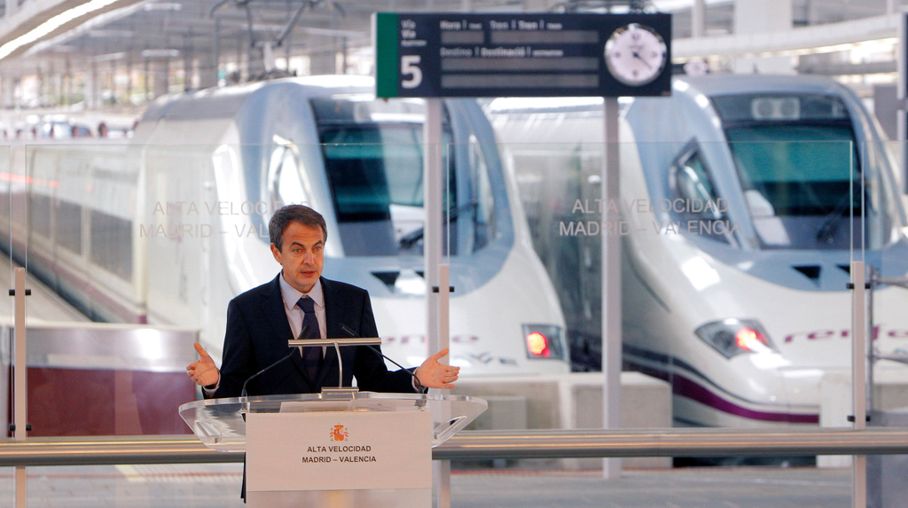 FILE - Former Spanish Prime Minister Jose Luis Rodriguez Zapatero speaks at Valencia train station, following the inaugural journey aboard a high-speed AVE train linking Madrid to Valencia, Spain, Dec. 18, 2010. (AP Photo/Alberto Saiz, File)