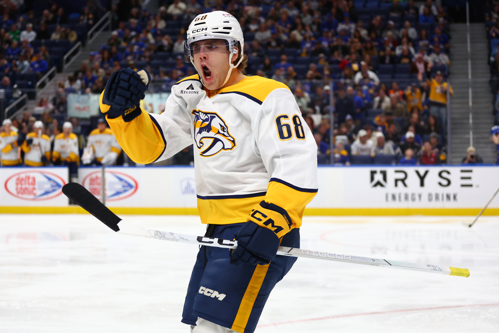 Nashville Predators left wing Zachary L'heureux (68) celebrates his goal during the second period of an NHL hockey game against the Buffalo Sabres, Saturday, March 7, 2026, in Buffalo, N.Y. (AP Photo/Jeffrey T. Barnes)