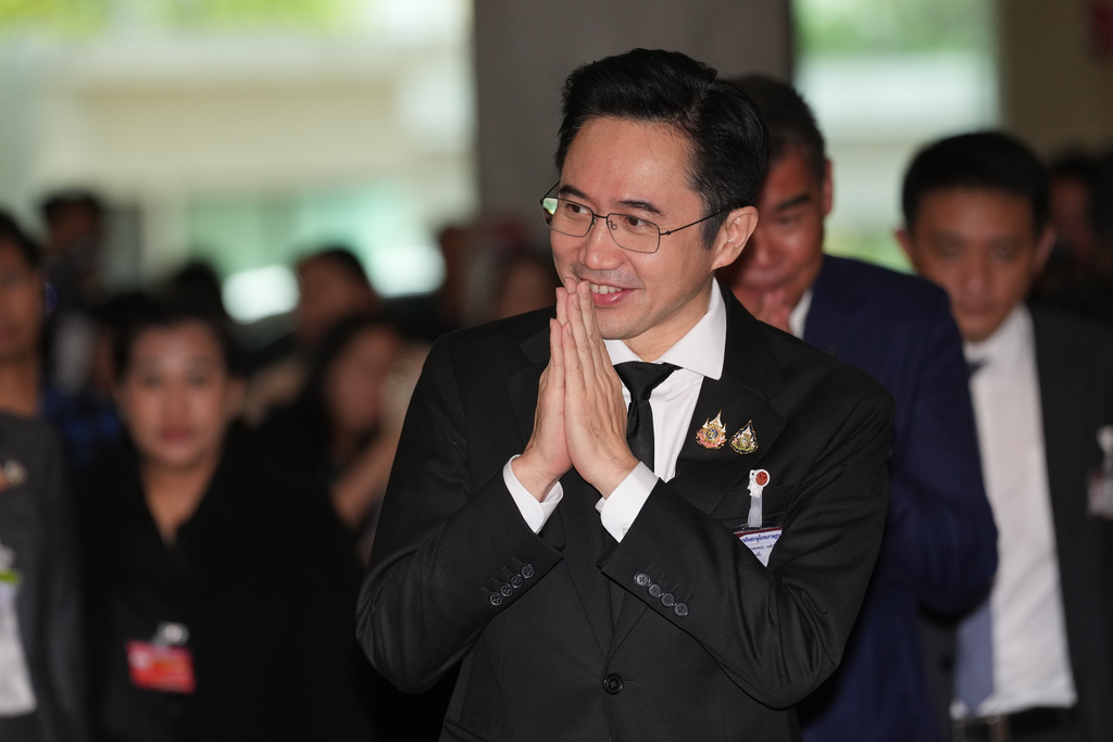 Yodchanun Wongsawat from Pheu Thai Party arrives at the parliament in Bangkok, Thailand, Thursday, March 19, 2026. (AP Photo/Sakchai Lalit)