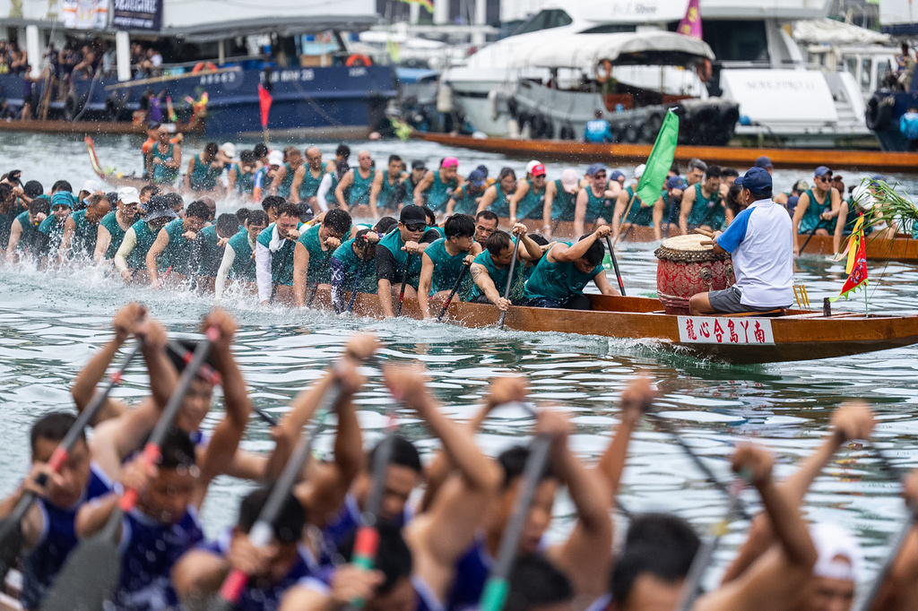 Competitors take part in the Aberdeen Dragon Boat Race to celebrate the Dragon Boat Festival in Hong Kong, Friday, June 19, 2026. (AP Photo/Chan Long Hei)
