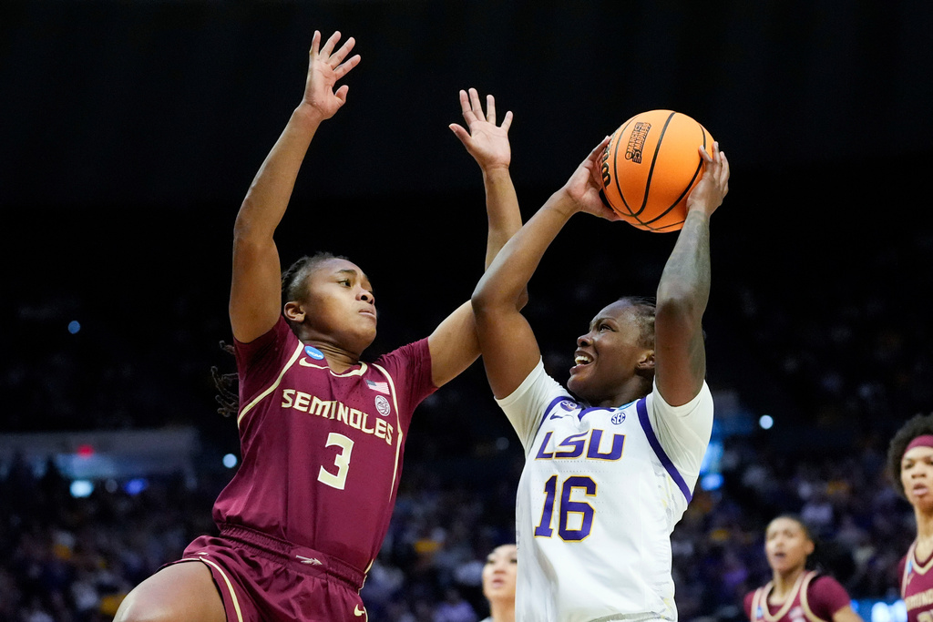 FILE - LSU guard Kailyn Gilbert (16) goes to the basket against Florida State guard O'Mariah Gordon (3) during the first half in the second round of the NCAA college basketball tournament, March 24, 2025, in Baton Rouge, La. (AP Photo/Gerald Herbert, File)