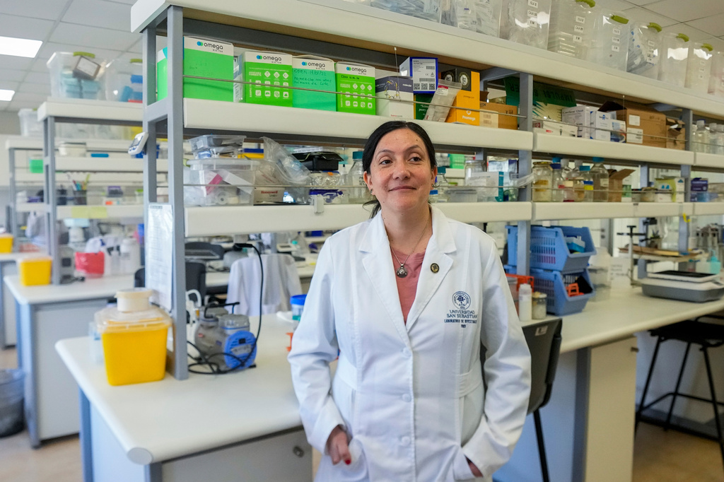 María Inés Barría, a virologist at the Universidad San Sebastián, poses for picture at the university, in Santiago, Chile, Wednesday, May 20, 2026. (AP Photo/Esteban Felix)