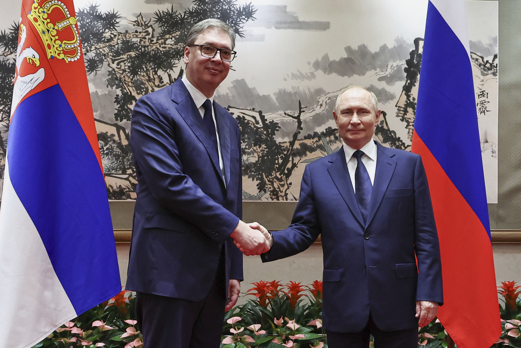 Russian President Vladimir Putin, right, and Serbian President Aleksandar Vucic pose for a photo during their meeting at Diaoyutai State Guesthouse in Beijing, China, Tuesday, Sept. 2, 2025. (Alexander Kazakov,Sputnik, Kremlin Pool Photo via AP)