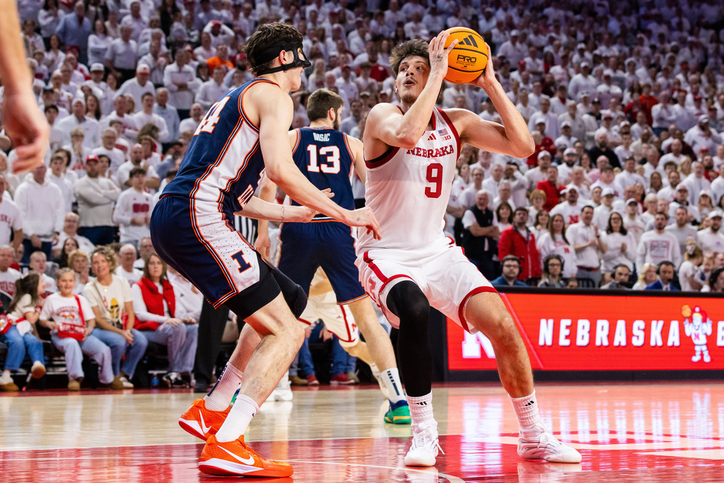Nebraska forward Berke Büyüktuncel (9) drives against Illinois center Zvonimir Ivisic (44) during the first half of an NCAA college basketball game, Sunday, Feb. 1, 2026, in Lincoln, Neb. (AP Photo/Bonnie Ryan)