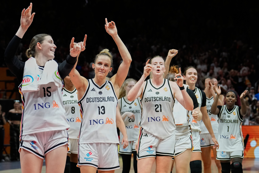 German players celebrate after the Women's Basketball World Cup match between the Germany and Mali in Berlin, Monday, Sept. 7, 2026. (AP Photo/Ebrahim Noroozi)