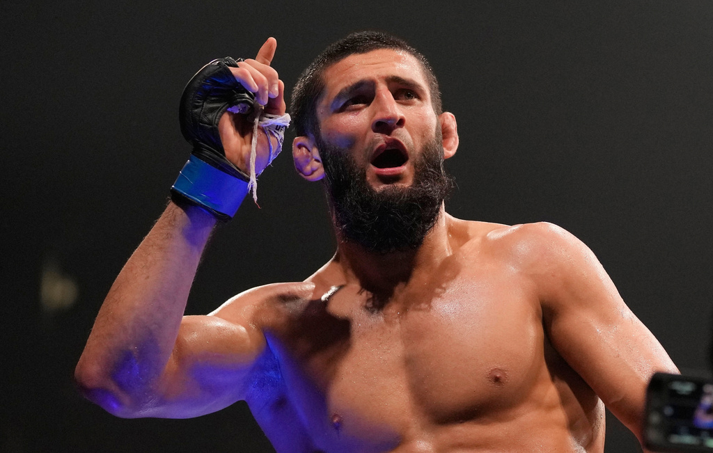 FILE - Khamzat Chimaev of the United Arab Emirates, celebrates after he beats Kamaru Usman of Nigeria, in the UFC middleweight championship fight at the Ethihad Arena in Abu Dhabi, United Arab Emirates, Saturday, Oct. 21, 2023. (AP Photo/Kamran Jebreili, File)