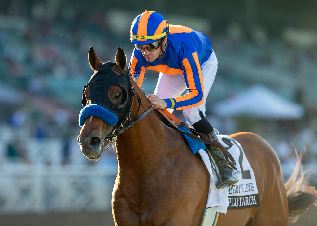 In this image provided by Benoit Photo, Magnier, Smith and Tabor's Plutarch and jockey Florent Geroux win the Grade III $100,000 Robert B. Lewis Stakes, Saturday, Feb. 7, 2026 at Santa Anita Park, Arcadia, Calif. (Benoit Photo via AP)