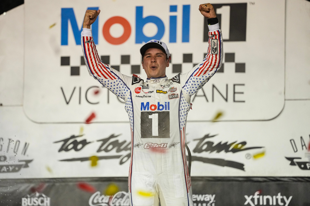 Christopher Bell celebrates in Victory Lane after winning a NASCAR Cup Series auto race Sunday, Sept. 6, 2026, in Darlington, S.C. (AP Photo/Matt Kelley)