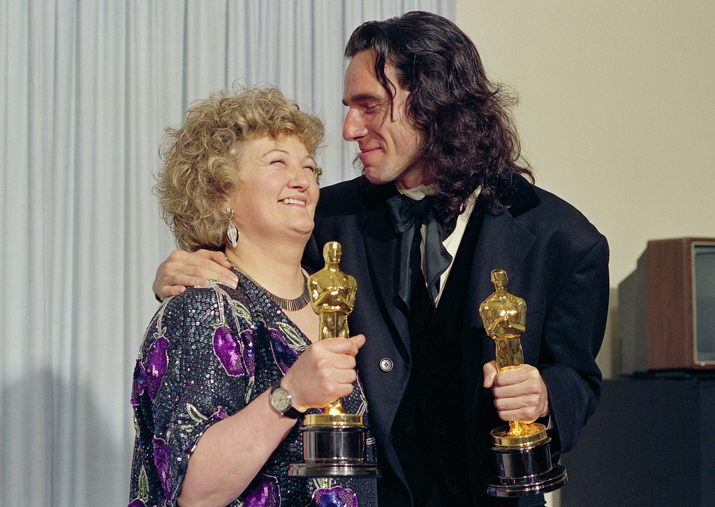 FILE - "My Left Foot" stars Brenda Fricker, winner of Oscar for best supporting actress, and Daniel Day Lewis, winner of Oscar for best actor, at the 62nd Annual Academy Awards in Los Angeles, March 26, 1990. (AP Photo/Bob Galbraith, File)
