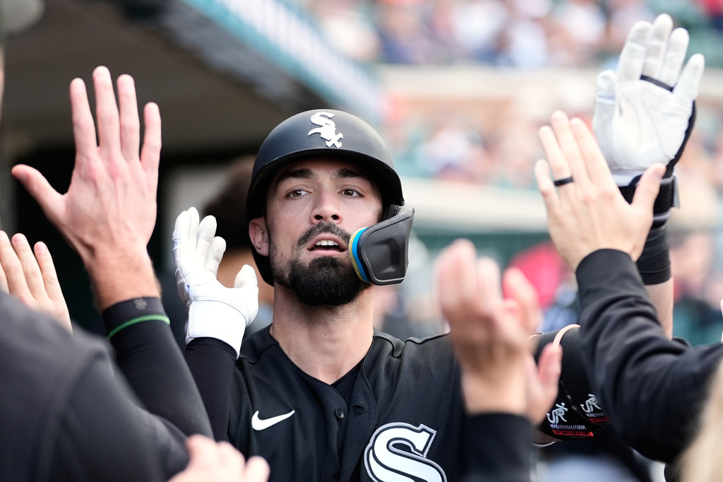 Chicago White Sox's Randal Grichuk (34) celebrates his home run against the Detroit Tigers during the first inning of a baseball game Friday, June 19, 2026, in Detroit. (AP Photo/Paul Sancya)