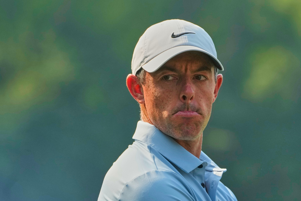 Rory McIlroy of Northern Ireland reacts during the DP World Tour Championship golf tournament in New Delhi, India, Thursday, Oct. 16, 2025. (AP Photo/Manish Swarup)