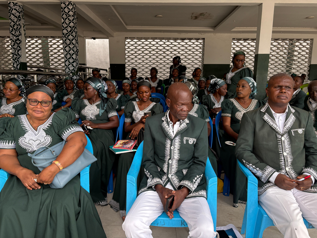 Kimbanguist Church members attend Easter Sunday service at a reception center for the faithful in Kinshasa, Democratic Republic of the Congo, Sunday, April 5, 2026. (AP Photo/Rodney Muhumuza)