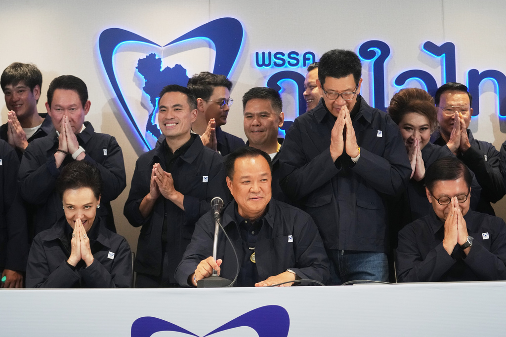 Thailand's Prime Minister and leader of Bhumjaithai Party Anutin Charnvirakul, center, speaks during a press conference at the party headquarters following the general election in Bangkok, Sunday, Feb. 8, 2026. (AP Photo/Sakchai Lalit)