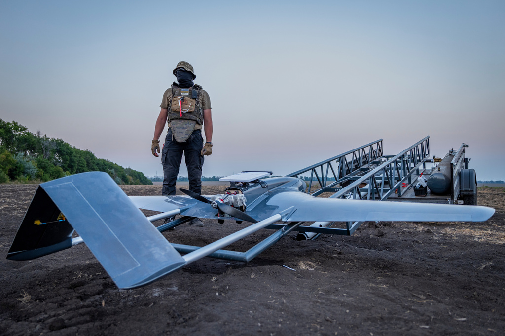 A Ukrainian serviceman prepares a "Chaklun" strike drone used for deep-strike operations against Russian positions in Crimea, in an undisclosed location in Ukraine on Thursday, Aug. 6, 2026. (AP Photo/Dan Bashakov)
