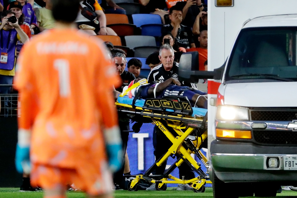 Houston Dynamo FC defender Diadie Samassekou is put into an ambulance after apparent injury during the first half of an MLS soccer match against Vancouver Whitecaps FC, Saturday, May 16, 2026, in Houston. (AP Photo/Michael Wyke)