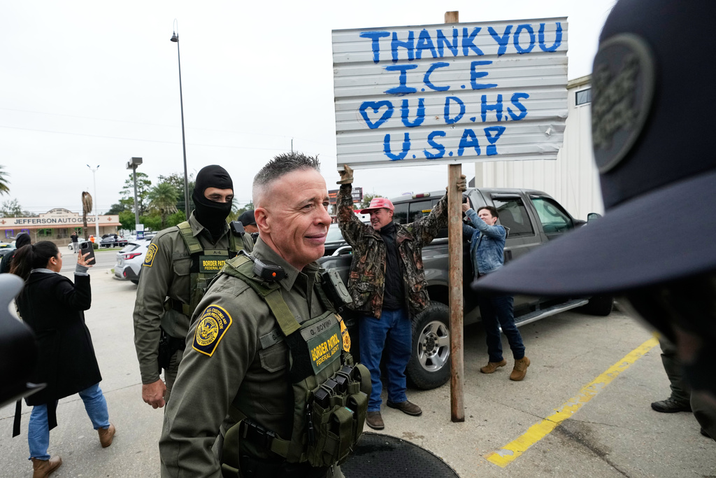 Customs and Border Patrol commander Gregory Bovino greets a supporter at a gas station during an immigration crackdown in Kenner, La., Friday, Dec. 5, 2025. (AP Photo/Gerald Herbert, file)