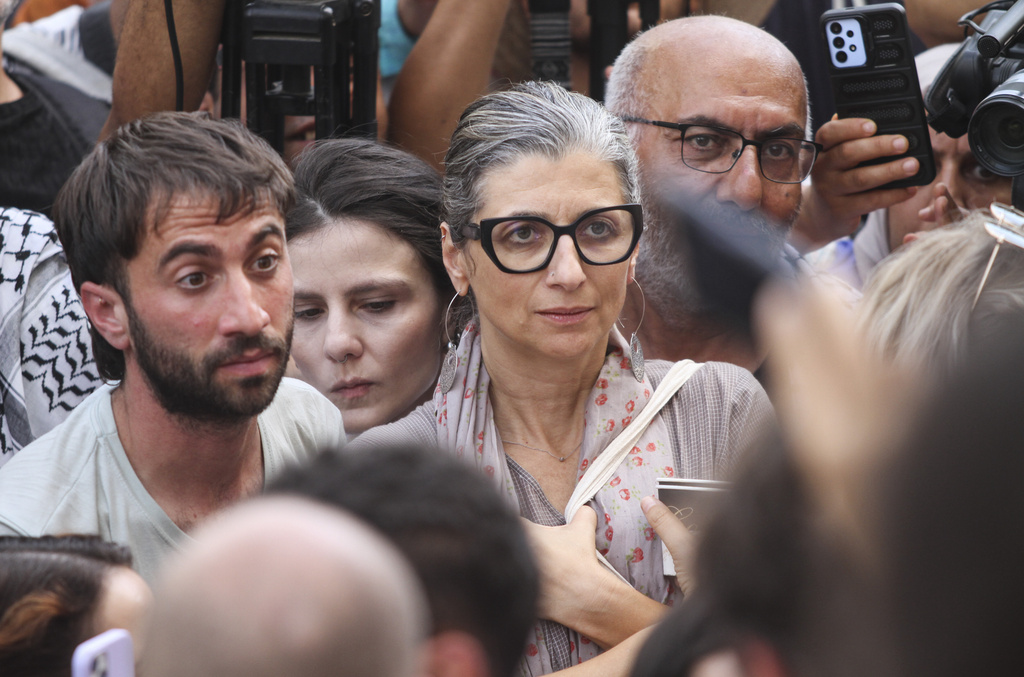 Francesca Albanese, the U.N. special rapporteur for the West Bank and Gaza, center, attends a press conference by international activists seeking to deliver aid to Gaza on a flotilla, in Tunis, Tunisia, Tuesday, Sept. 9, 2025. (AP Photo)