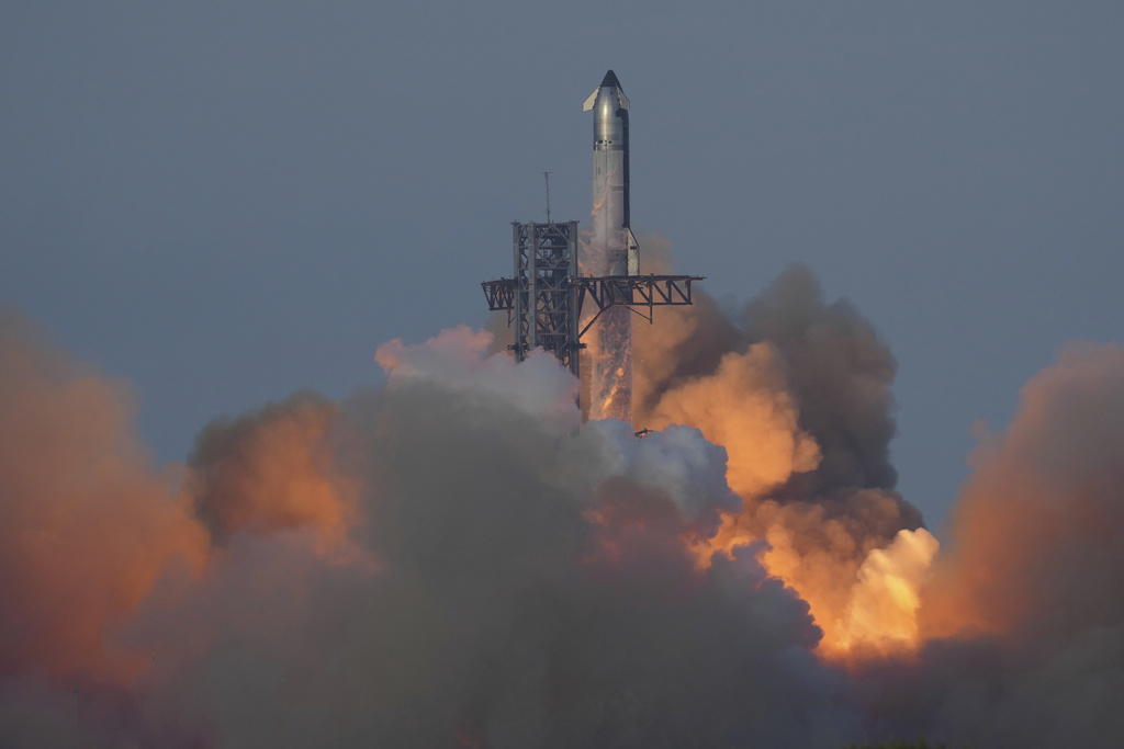 SpaceX's mega rocket Starship launches during a test flight from Starbase, Texas, Tuesday, Aug. 26, 2025. (AP Photo/Eric Gay)