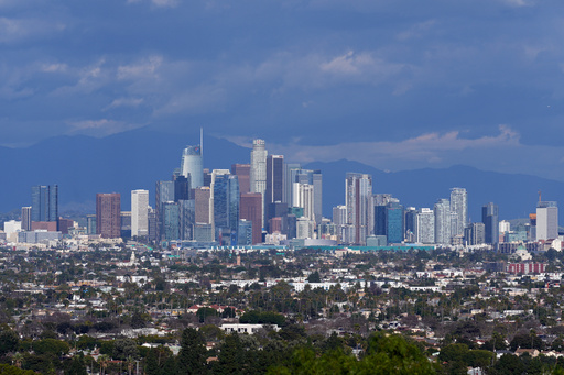 FILE - The Los Angeles skyline is seen from a Baldwin Hills overlook, Feb. 9, 2024. (AP Photo/Damian Dovarganes, File) FILE - The Los Angeles skyline is seen from a Baldwin Hills overlook, Feb. 9, 2024. (AP Photo/Damian Dovarganes, File)