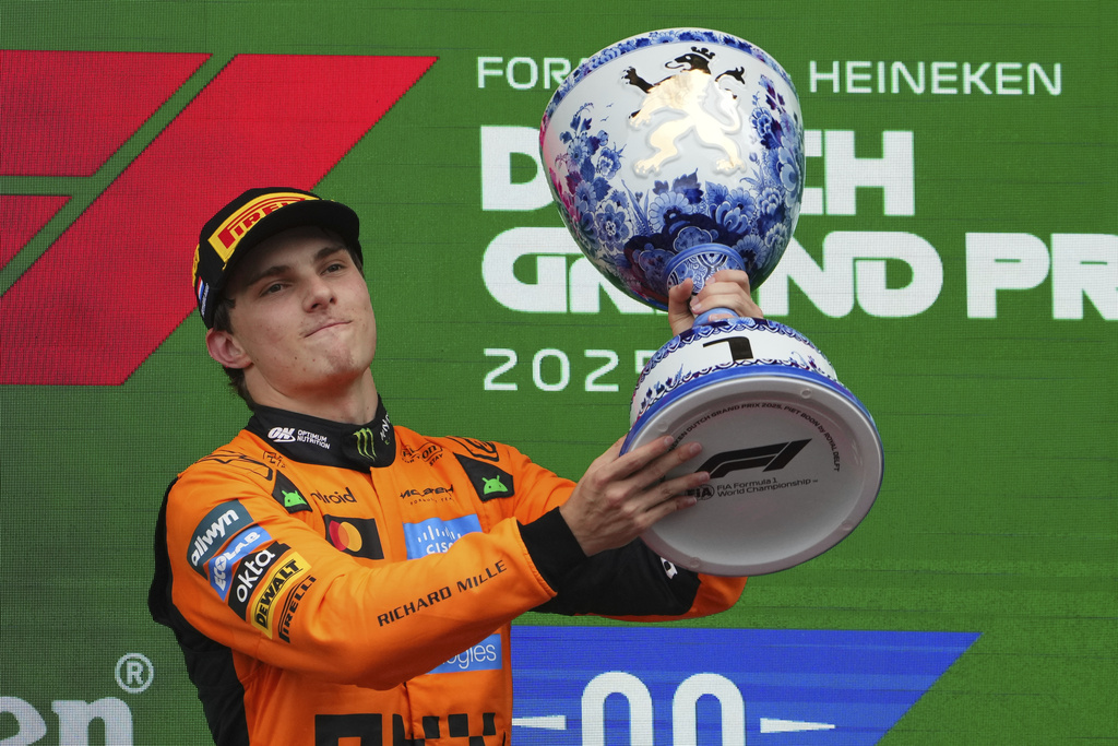 McLaren driver Oscar Piastri of Australia celebrtaes after winningthe Formula One Dutch Grand Prix in Zandvoort, Netherlands, Sunday, Aug. 31, 2025. (AP Photo/Peter Dejong)