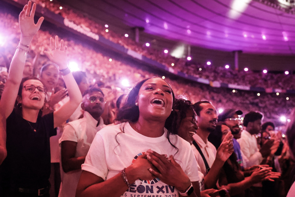 Faithful cheer Pope Leo XIV at the Stade de France in Saint-Denis near Paris during a prayer vigil with young people, Friday, Sept. 25, 2026. (AP Photo/Thomas Padilla)