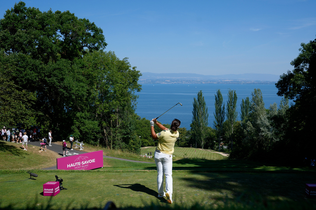 Haeran Ryu, of South Korea, plays on the 2nd hole during the last round of the Evian Championship women's golf tournament, in Evian, eastern France, Sunday, July 12, 2026. (AP Photo/Laurent Cipriani)