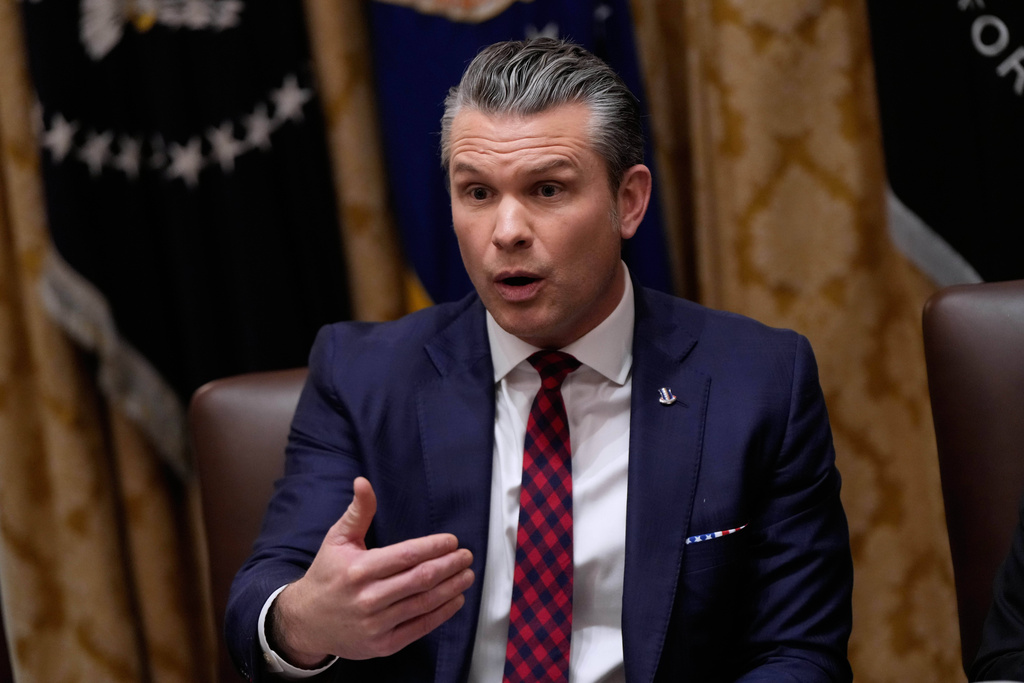 Defense Secretary Pete Hegseth speaks during a Cabinet meeting at the White House, Tuesday, Dec. 2, 2025, in Washington. (AP Photo/Julia Demaree Nikhinson)