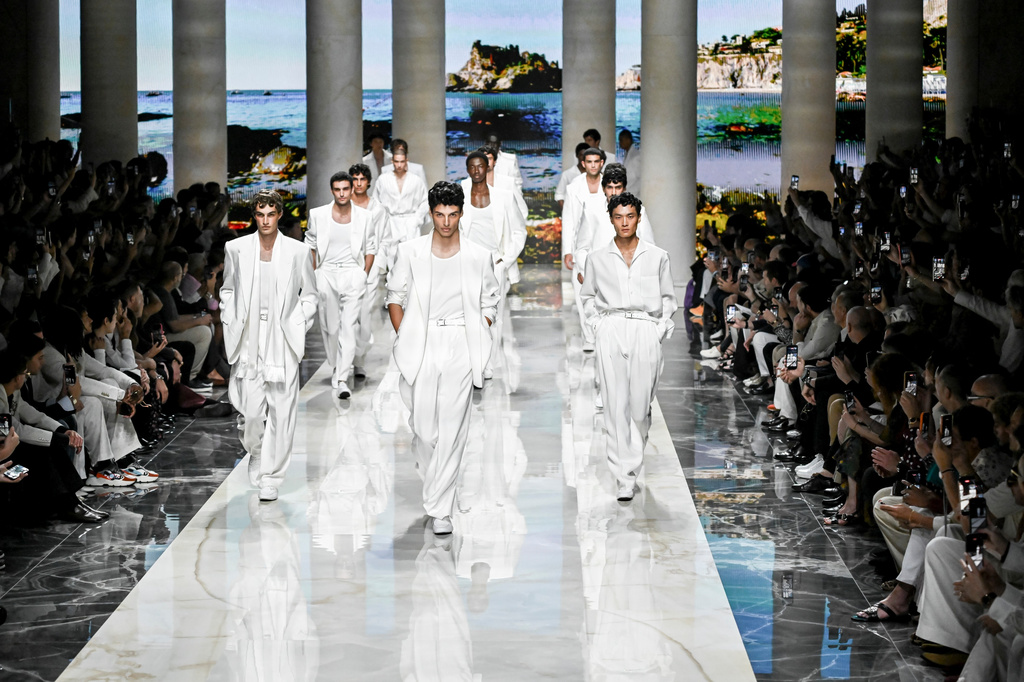 Models wear creations from the Dolce & Gabbana Spring/Summer 2027 Men's collection presented in Milan, Italy, Saturday, June 20, 2026. (AP Photo/Nicola Marfisi)