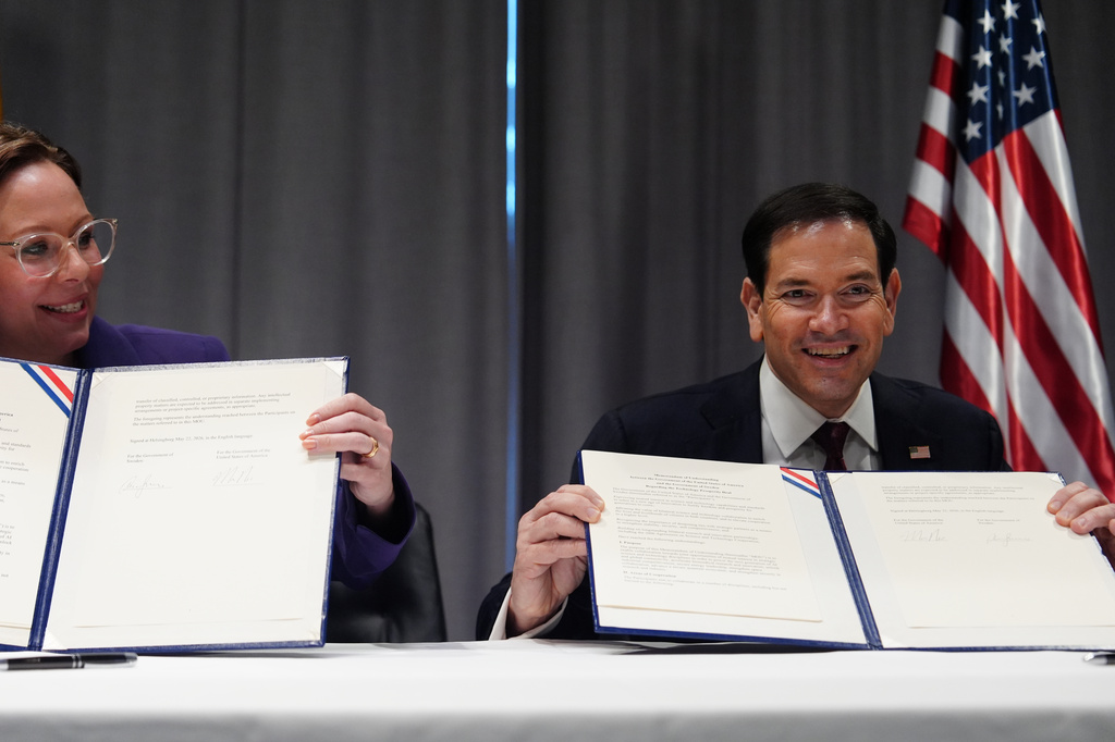 United States Secretary of State Marco Rubio, right, and Sweden's Foreign Minister Maria Malmer Stenergard hold up a memorandum of understanding during a signing ceremony on the sidelines of a meeting of NATO foreign ministers in Helsingborg, Sweden, Friday, May 22, 2026. (AP Photo/Julia Demaree Nikhinson, Pool)