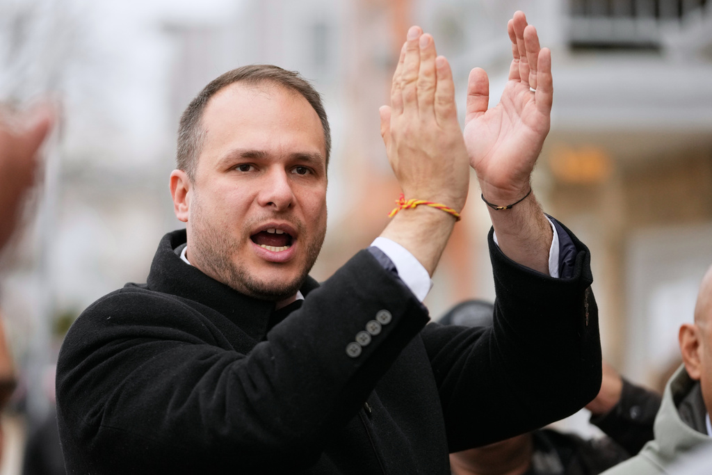FILE - Jersey City mayoral candidate James Solomon speaks to people at a food drive, Nov. 25, 2025, in Jersey City, N.J. (AP Photo/Frank Franklin II, File)