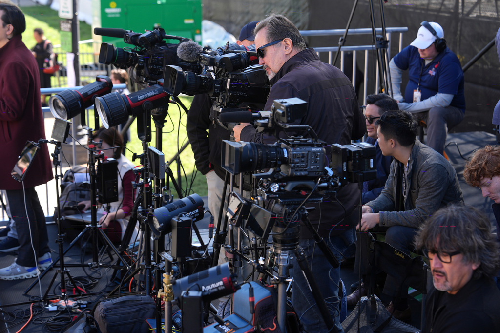 Television networks set up before President Donald Trump, first lady Melania Trump, China's President Xi Jinping and his wife Peng Liyuan arrive at the National Archives Museum, Friday, Sept. 25, 2026, in Washington. (AP Photo/Julia Demaree Nikhinson)