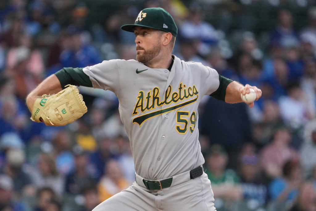 Athletics pitcher Jeffrey Springs throws the ball against the Chicago Cubs during the first inning in a baseball game Wednesday, June 3, 2026, in Chicago. (AP Photo/David Banks)
