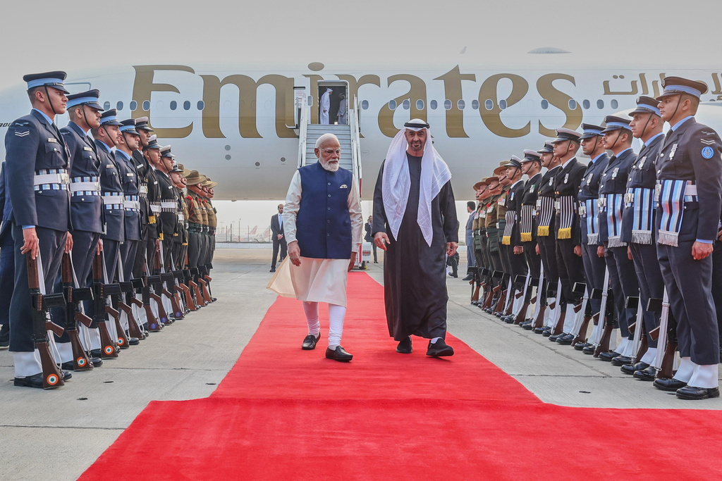 Indian Prime Minister Narendra Modi, left, walks with Sheikh Mohamed bin Zayed Al Nahyan, President of the United Arab Emirates upon his arrival at the airport in New Delhi, India, Monday, Jan. 19, 2026. (Indian Prime Minister's Office via AP)
