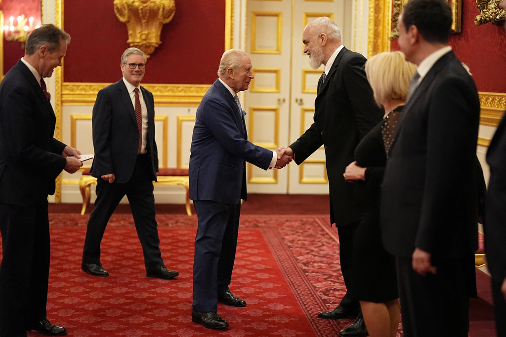 Britain's King Charles III greets the Prime Minister of the Republic of Albania Edi Rama, during a reception for Western Balkans leaders at St James's Palace, London, Tuesday, Oct. 21, 2025, on the eve of the Western Balkans Leaders' Summit. (Aaron Chown/Pool Photo via AP)