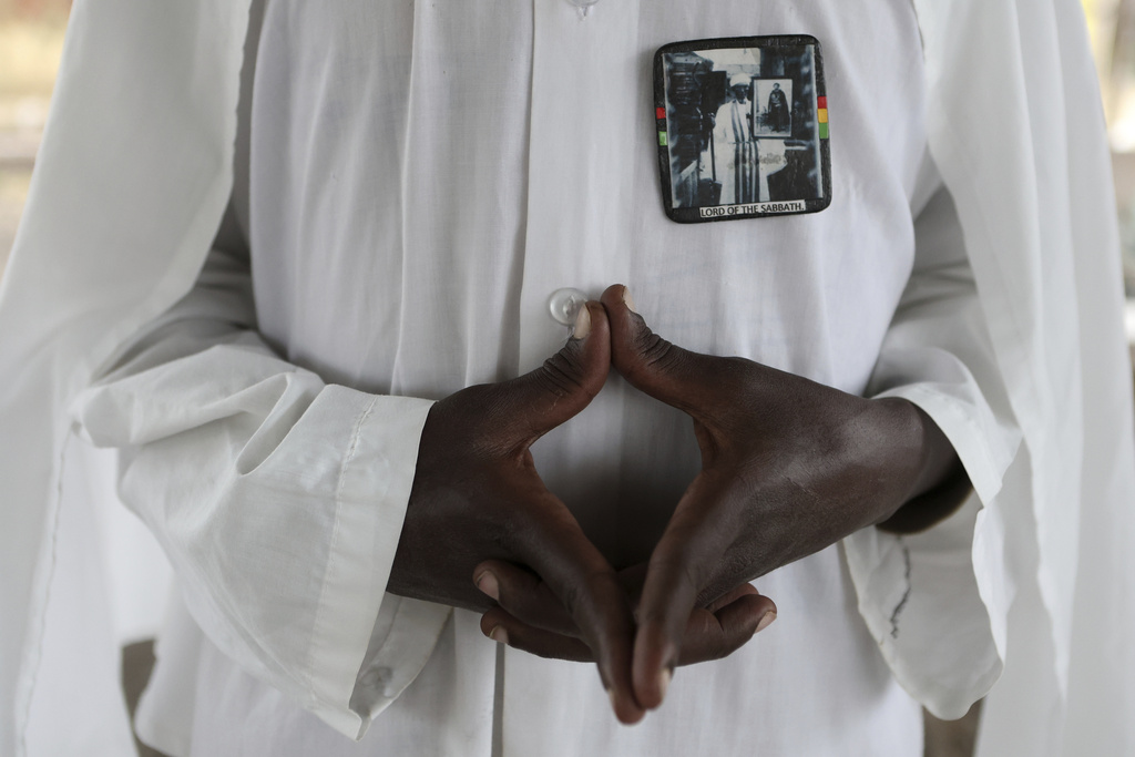 A member of the Ethiopia Africa Black International Congress Church of Salvation attend a church service in Kamulu, Nairobi, Kenya, Wednesday, July 23, 2025. (AP Photo/Andrew Kasuku)