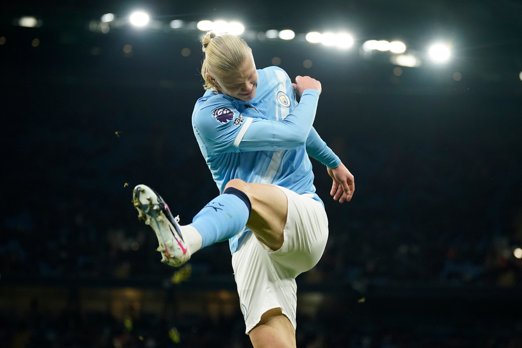 Manchester City's Erling Haaland reacts after missing a chance to score a goal during the English Premier League soccer match between Manchester City and West Ham United in Manchester, England, Saturday, Dec. 20, 2025. (AP Photo/Dave Thompson)