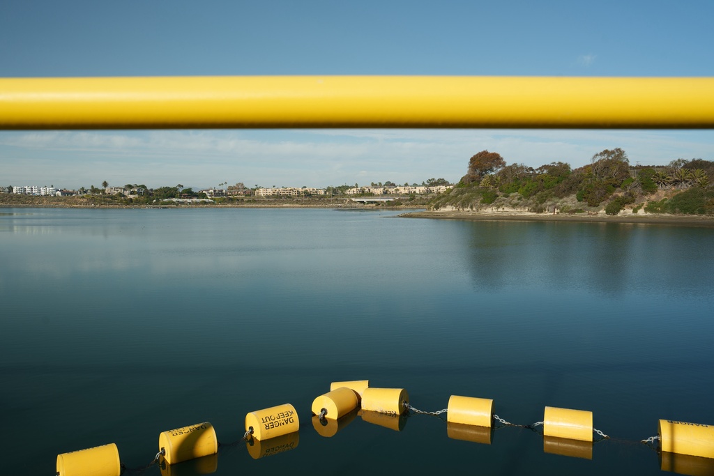A sectioned-off area of the Agua Hedionda Lagoon marks the seawater intake for the Carlsbad desalination plant in Carlsbad, Calif., Tuesday, Dec. 2, 2025. (AP Photo/Annika Hammerschlag)