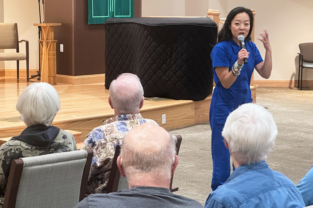 Francesca Hong, a candidate for Wisconsin governor, speaks to voters at a retirement home, Tuesday, July 7, 2026, in Madison, Wis. (AP Photo/Scott Bauer)