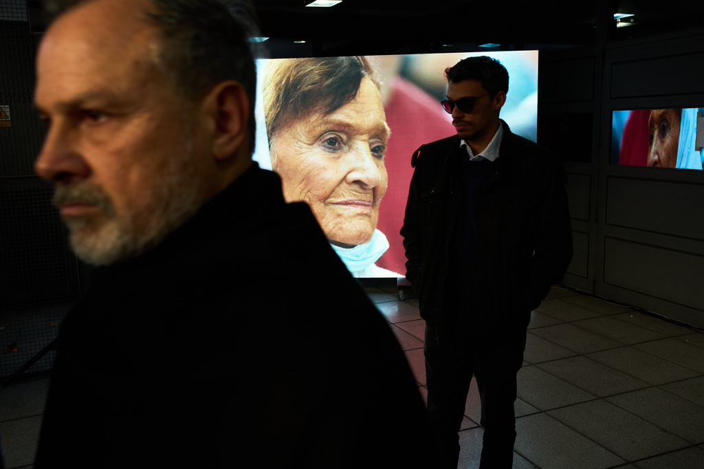FILE - An image of Taty Almeida, one of the founders of the Mothers of Plaza de Mayo human rights group, is displayed on a screen during her wake in Buenos Aires, Argentina, June 15, 2026. (AP Photo/Rodrigo Abd, File)