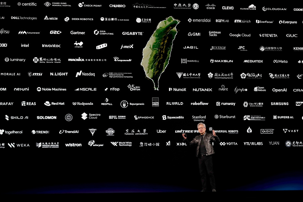 Nvidia CEO Jensen Huang delivers a speech during the Computex 2026 exhibition in Taipei, Taiwan, Monday, June 1, 2026. (AP Photo/Chiang Ying-ying)