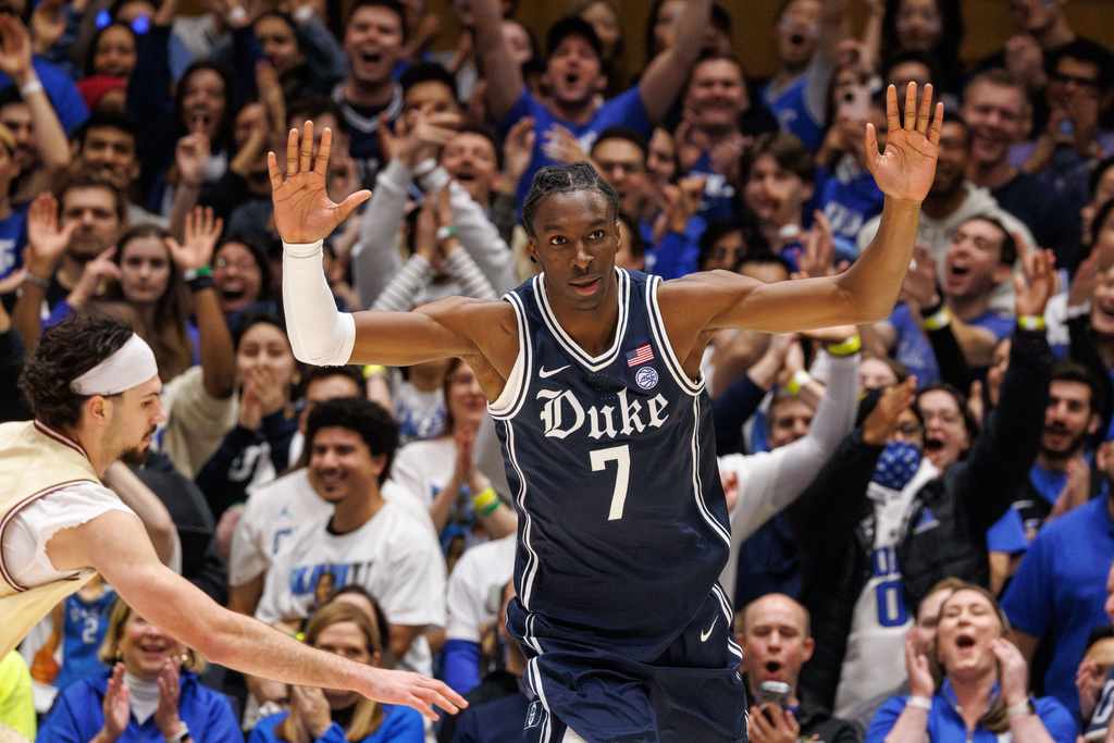 Duke's Dame Sarr (7) celebrates after a play during the first half of an NCAA college basketball game against Boston College in Durham, N.C., Tuesday, Feb. 3, 2026. (AP Photo/Ben McKeown)