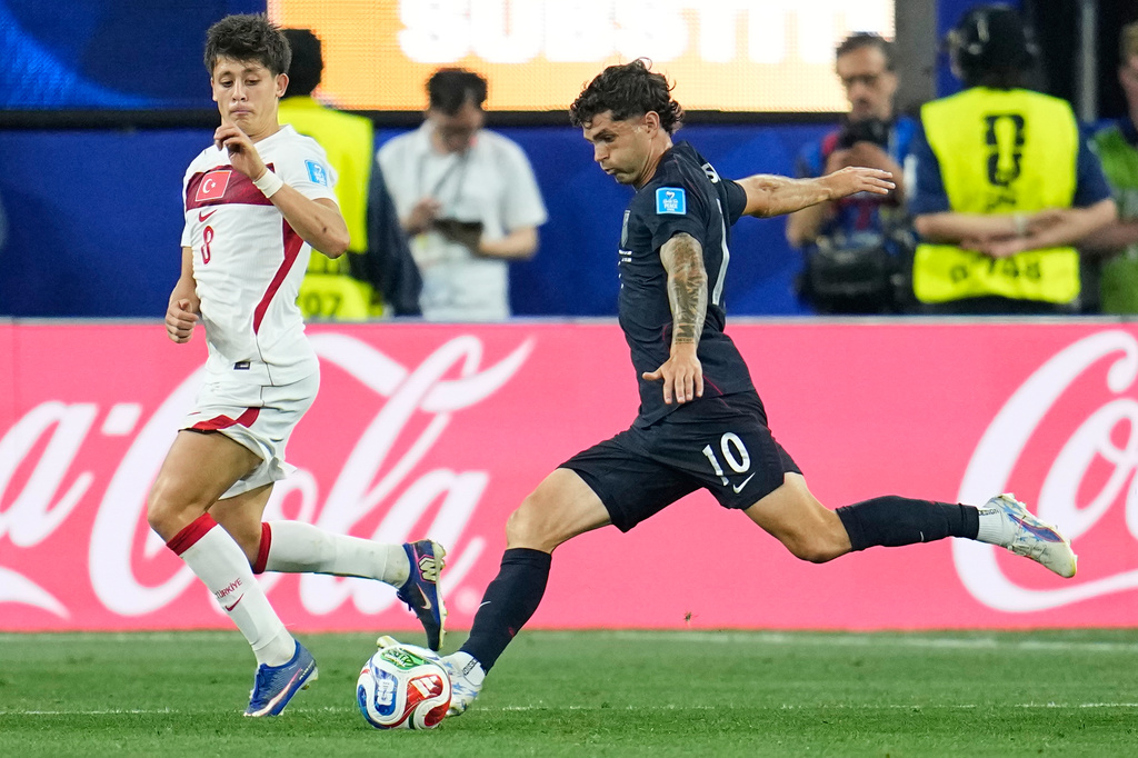 United States' Christian Pulisic (10) kicks the ball during the World Cup Group D soccer match between Turkey and the United States in Inglewood, Calif., near Los Angeles, Thursday, June 25, 2026. (AP Photo/Gregory Bull)