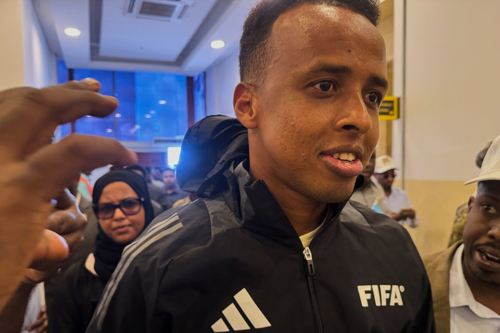 Referee Omar Artan, who was denied entry to the United States, arrives in Mogadishu, Somalia, Wednesday, June 10, 2026. (AP Photo/Farah Abdi Warsameh)