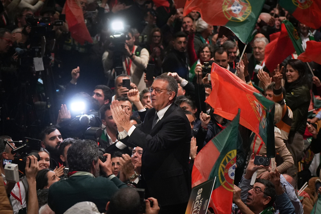 Center-left Socialist candidate António José Seguro celebrates after defeating far-right populist André Ventura in the second round of Portugal's presidential election in Lisbon, Sunday, Feb. 8, 2026. (AP Photo/Ana Brigida)