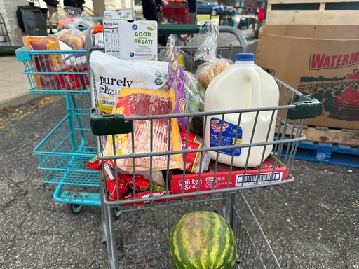 Food and milk sit in a shopping cart during a Forgotten Harvest distribution event held at Woodside Bible Church, Friday, Oct. 24, 2025, in Pontiac, Mich. (AP Photo/Mike Householder) Food and milk sit in a shopping cart during a Forgotten Harvest distribution event held at Woodside Bible Church, Friday, Oct. 24, 2025, in Pontiac, Mich. (AP Photo/Mike Householder)