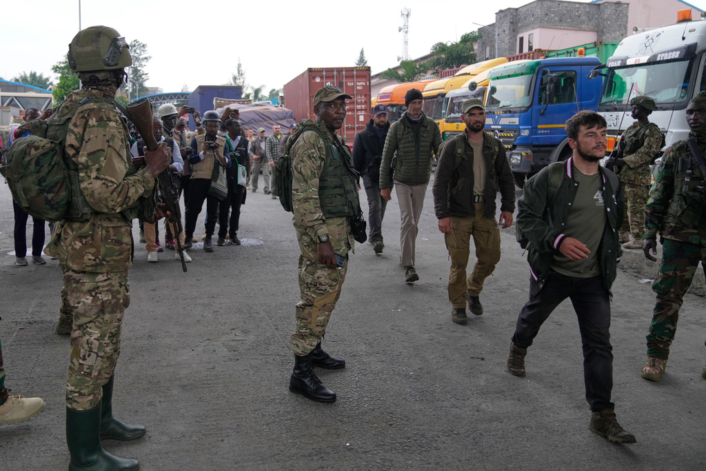 Willy Ngoma, spokesperson for the Rwanda-backed M23 rebels fighting in eastern Congo, center, releases captured mercenaries at the Gisenyi border point in eastern Democratic Republic of Congo, Wednesday, Jan. 29, 2025. Willy Ngoma was killed in a drone strike Tuesday Feb. 24, 2026. (AP Photo/Brian Inganga)