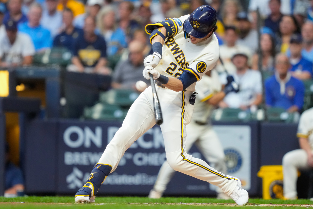 Milwaukee Brewers designated hitter Christian Yelich hits a three-run home run during the first inning of a baseball game against the Chicago Cubs Wednesday, Sept. 9, 2026, in Milwaukee. (AP Photo/Kayla Wolf)